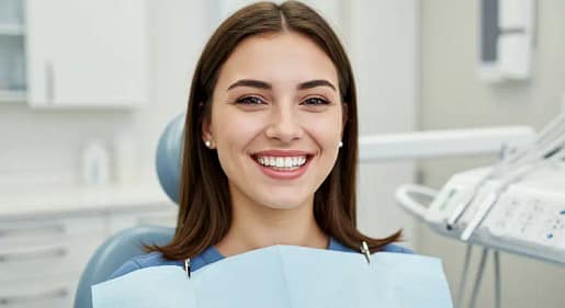 Young woman with a bright, confident smile after professional teeth cleaning at We Care Dental in Dublin, CA