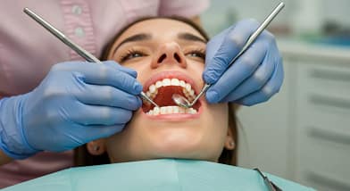 Dr. Lardizabal applying a tooth-colored filling at We Care Dental in Dublin, CA – gentle cavity treatment for a natural smile.