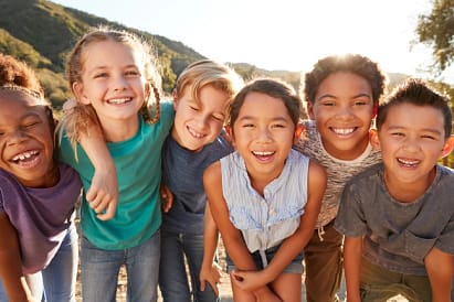 Stress-Free Kids’ Dentist Dublin CA | We Care Dental Happy children smiling after a positive dental checkup at We Care Dental in Dublin CA, with Dr. Chona Lardizabal’